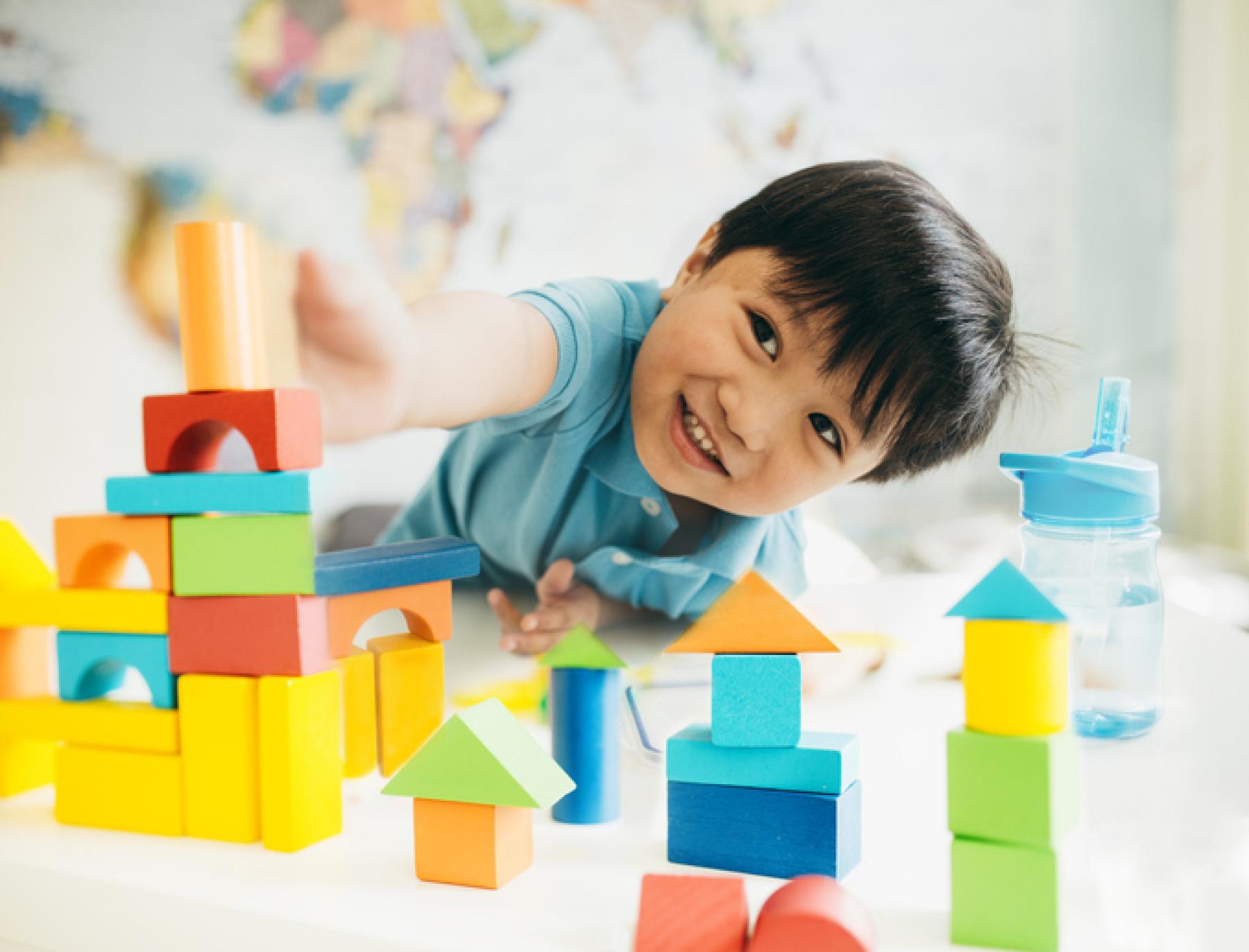Kid playing with blocks